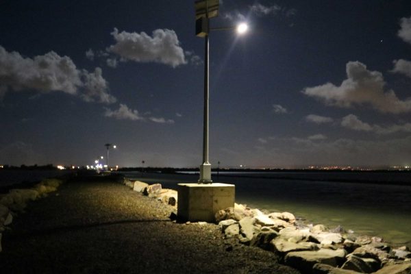 Temporary solar lighting on rock jetty at St. kilda South Australia